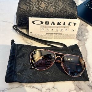 Oakley Rose Gold Aviator Sunglasses with Dark Mirrored Lenses